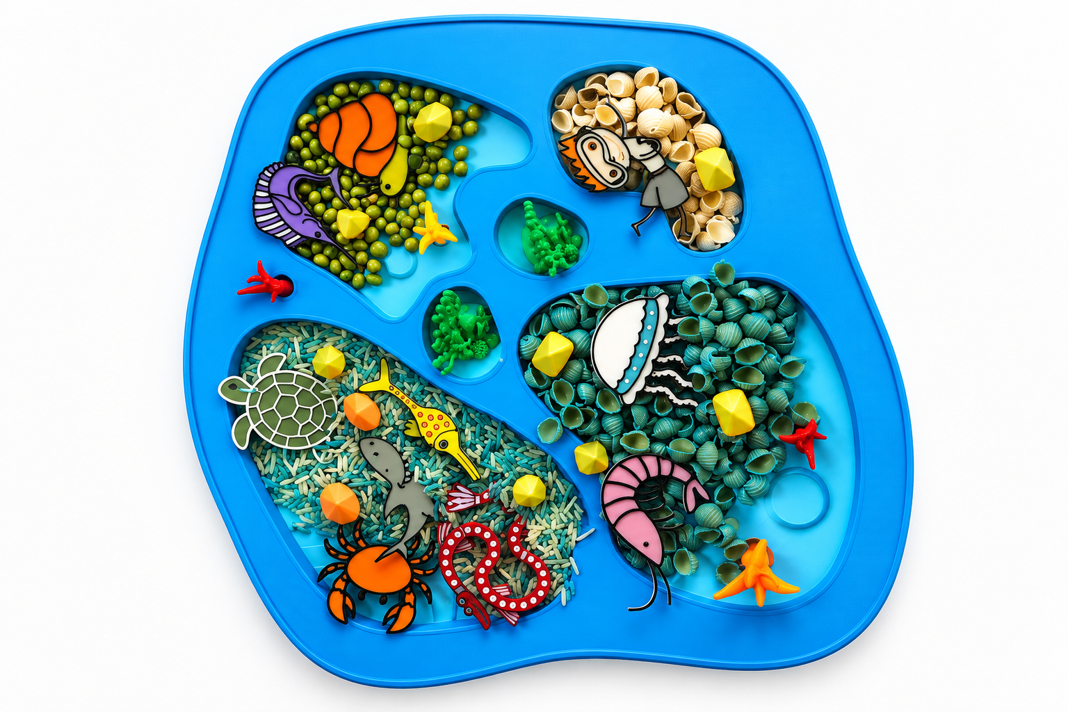 Ocean sensory tray filled with colorful sea animals and sensory materials