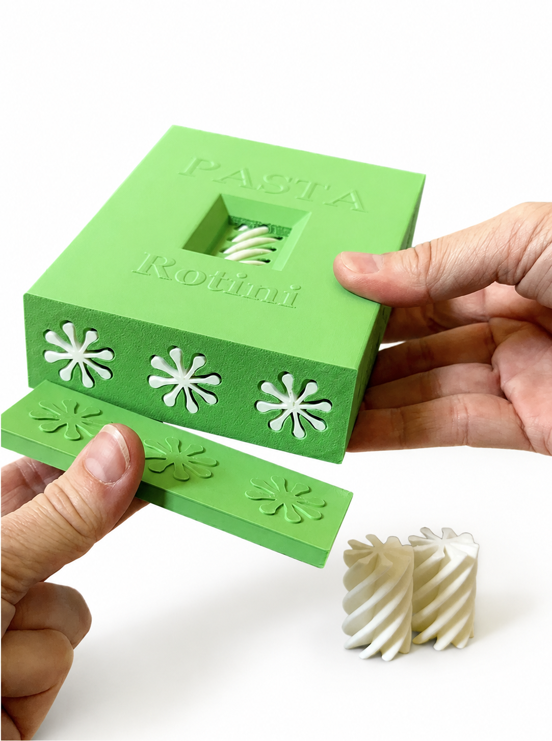 Green pasta dispenser with removable bottom tray