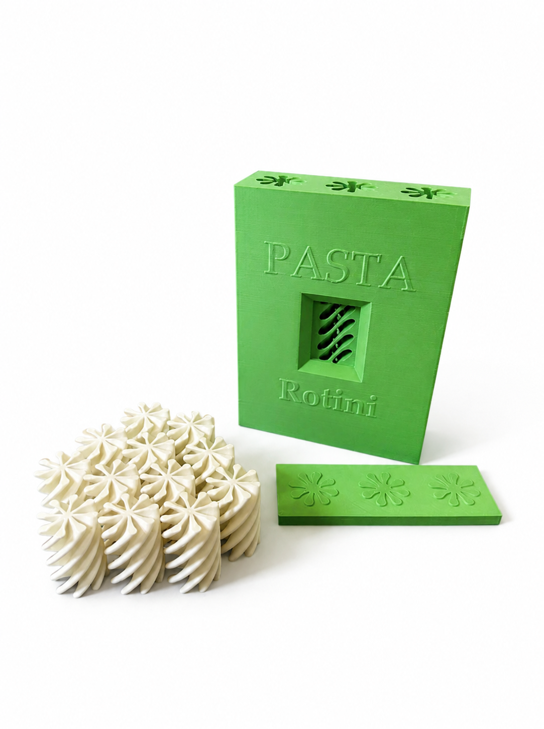 Green pasta dispenser, removable tray and toy pasta pieces