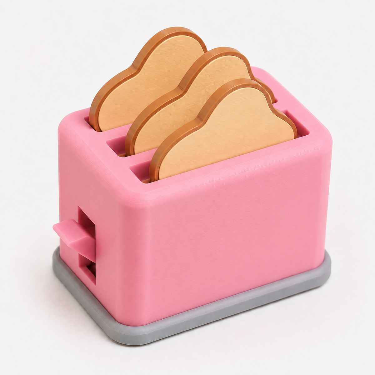Pink pretend play toaster with four bread pieces